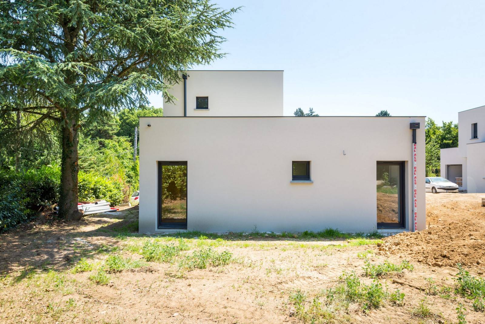 Maison contemporaine neuve construite de A à Z à Saint Genis Laval dans l'Ouest lyonnais (69) - photo 2