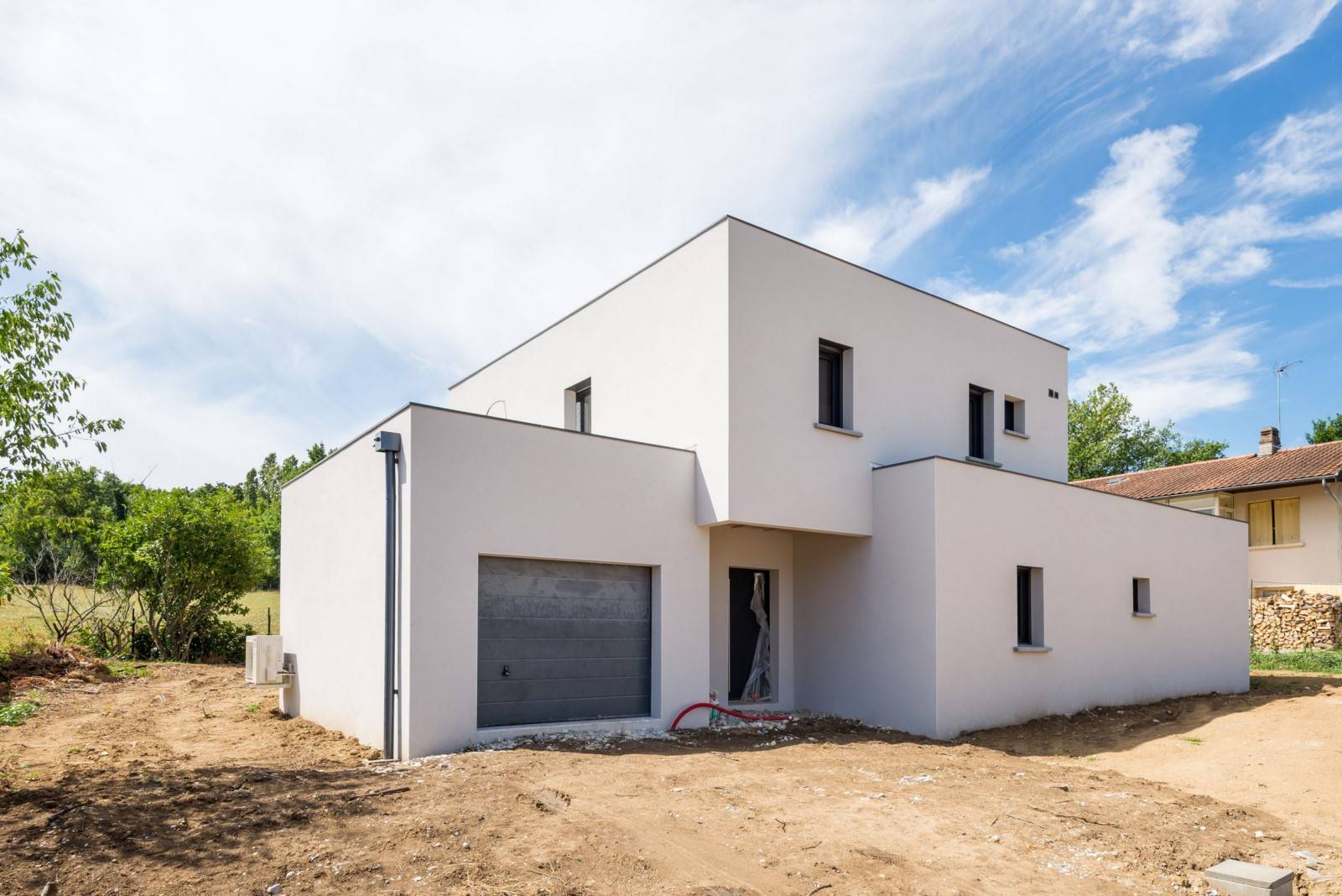Réalisation d'une maison contemporaine à toit plat à Saint Genis Laval dans le Rhône (69) - photo 3