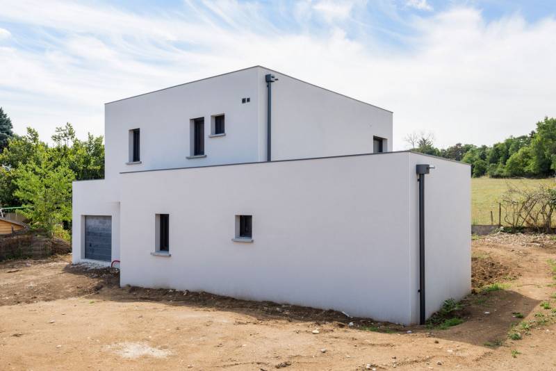Réalisation d'une maison contemporaine à toit plat à Saint Genis Laval dans le Rhône (69) - photo 4