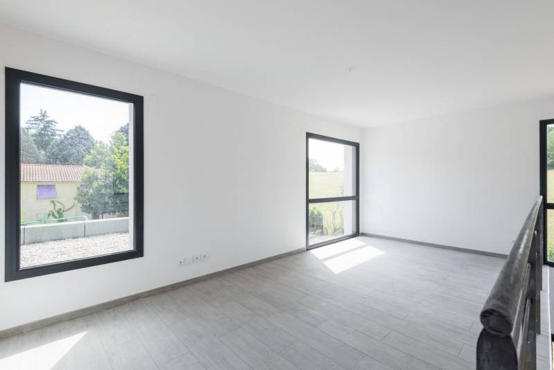 Réalisation d'une maison contemporaine à toit plat à Saint Genis Laval dans le Rhône (69) - photo 5