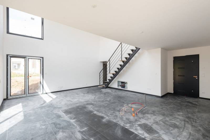 Réalisation d'une maison contemporaine à toit plat à Saint Genis Laval dans le Rhône (69) - photo 8