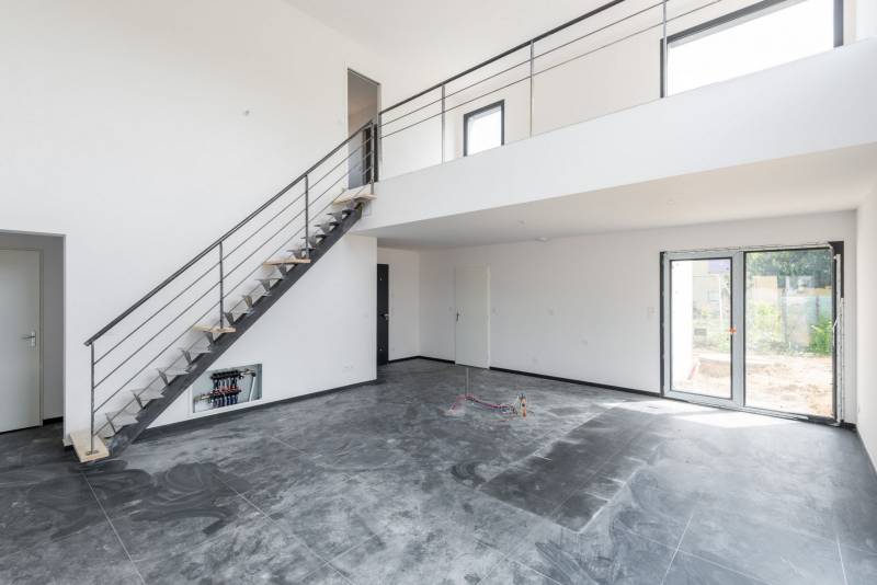 Réalisation d'une maison contemporaine à toit plat à Saint Genis Laval dans le Rhône (69) - photo 9